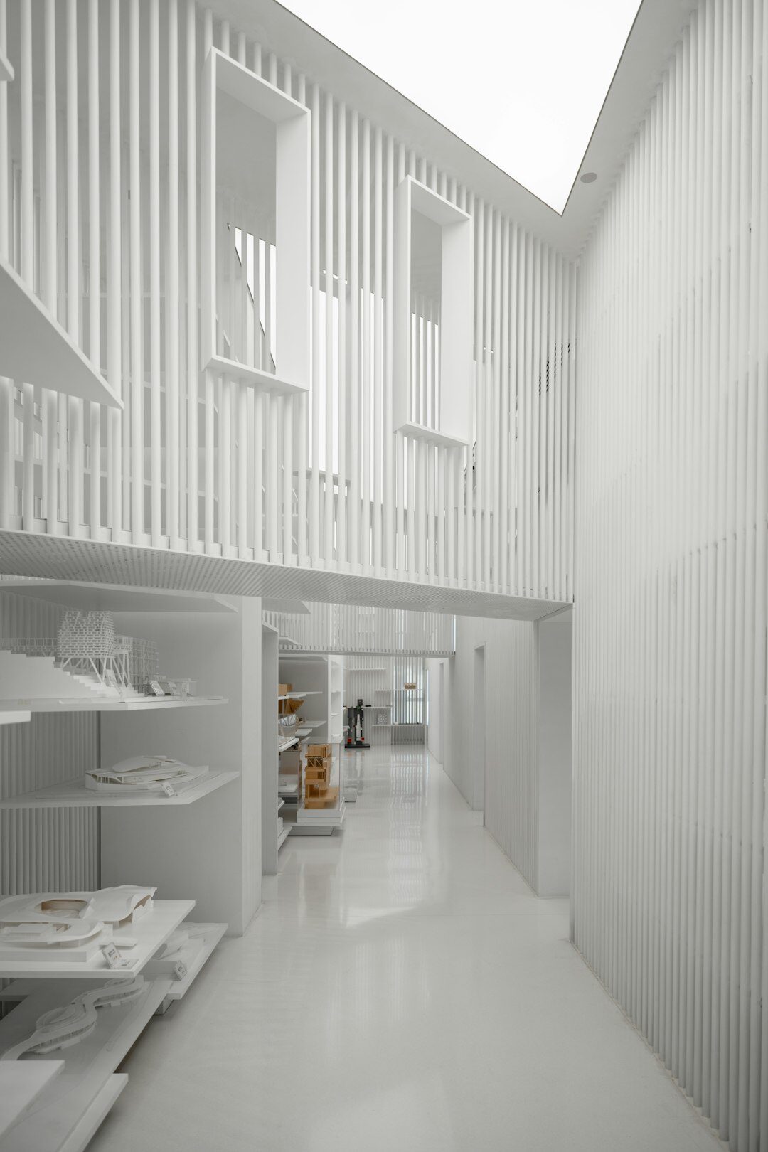 Minimalist architectural interior hallway with natural light