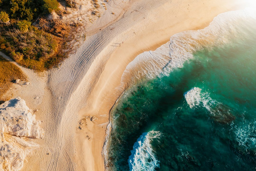 Aerial drone view of the José Ignacio coastline at golden hour